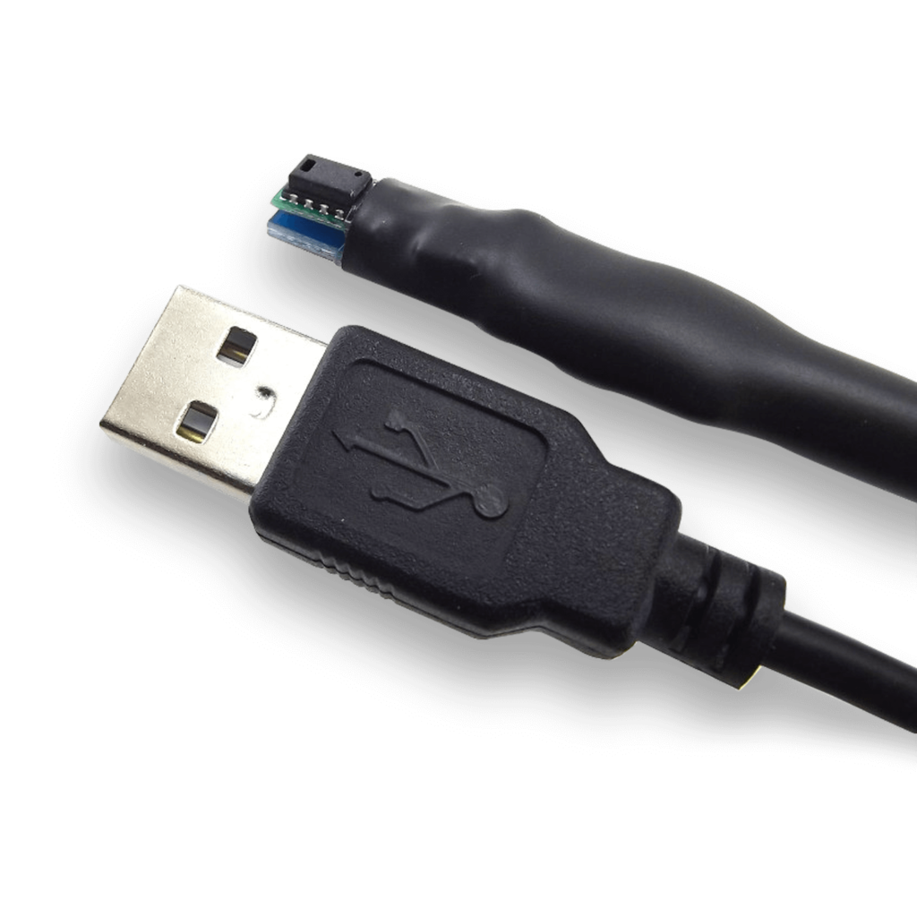 TRH200: USB-connected temperature and relative humidity measuring instrument with exposed sensor.
